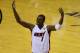 Jun 10, 2014; Miami, FL, USA; Miami Heat center Chris Bosh (1) reacts after shooting a three-pointer against the San Antonio Spurs during the second half of game three of the 2014 NBA Finals at American Airlines Arena. Mandatory Credit: Bob Donnan-USA TODAY Sports
