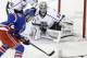 New York Rangers left wing Chris Kreider (20) looks to score against Los Angeles Kings goalie Jonathan Quick (32) in the first period during Game 4 of the NHL hockey Stanley Cup Final, Wednesday, June 11, 2014, in New York. (AP Photo/Frank Franklin II)
