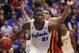 Kansas center Joel Embiid (21) works around Iowa State forward Georges Niang, back, during the first half of an NCAA college basketball game in Lawrence, Kan., Wednesday, Jan. 29, 2014. Kansas won 92-81. (AP Photo/Orlin Wagner)