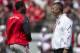 Apr 12, 2014; Columbus, OH, USA Ohio State Buckeyes head coach Urban Meyer talks with quarterback Braxton Mille prior to the Ohio State Buckeyes Spring Game at Ohio Stadium. The Scarlet team won 17-7. Mandatory Credit: Greg Bartram-USA TODAY Sports
