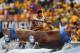 SAO PAULO, BRAZIL - JUNE 12: A performer is carried in a boat during the Opening Ceremony of the 2014 FIFA World Cup Brazil prior to the Group A match between Brazil and Croatia at Arena de Sao Paulo on June 12, 2014 in Sao Paulo, Brazil. (Photo by Buda Mendes/Getty Images)