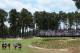 PINEHURST, NC - JUNE 12: Webb Simpson of the United States, Rory McIlroy of Northern Ireland and Graeme McDowell of Northern Ireland walk to the 17th green with their caddies during the first round of the 114th U.S. Open at Pinehurst Resort & Country Club, Course No. 2 on June 12, 2014 in Pinehurst, North Carolina. (Photo by Andrew Redington/Getty Images)