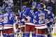 New York Rangers center Brian Boyle (22), center, greets defenseman Ryan McDonagh (27) after the Rangers beat the Los Angeles Kings 2-1 in Game 4 of the NHL hockey Stanley Cup Final, Wednesday, June 11, 2014, in New York. (AP Photo/Seth Wenig)
