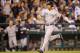 SEATTLE, WA - JUNE 10: Derek Jeter #2 of the New York Yankees scores on an RBI single by Jacoby Ellsbury in the eighth inning against the Seattle Mariners at Safeco Field on June 10, 2014 in Seattle, Washington. (Photo by Otto Greule Jr/Getty Images)