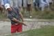 Rory McIlroy, of Northern Ireland, hits out of the bunker on the 6th hole during the first round of the U.S. Open golf tournament in Pinehurst, N.C., Thursday, June 12, 2014. (AP Photo/Eric Gay)