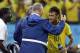 Brazil's Neymar is congratulated by Brazil's coach Luiz Felipe Scolari after Neymar scored during the group A World Cup soccer match between Brazil and Croatia, the opening game of the tournament, in the Itaquerao Stadium in Sao Paulo, Brazil, Thursday, June 12, 2014. (AP Photo/Kirsty Wigglesworth)