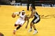 MIAMI, FL - JUNE 12: LeBron James #6 of the Miami Heat drives against Kawhi Leonard #2 of the San Antonio Spurs during Game Four of the 2014 NBA Finals at American Airlines Arena on June 12, 2014 in Miami, Florida. NOTE TO USER: User expressly acknowledges and agrees that, by downloading and/or using this photograph, user is consenting to the terms and conditions of the Getty Images License Agreement. Mandatory Copyright Notice: Copyright 2014 NBAE (Photo by Joe Murphy/NBAE via Getty Images)