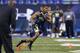 INDIANAPOLIS, IN - FEBRUARY 23: Former Washington running back Bishop Sankey works out during the 2014 NFL Combine at Lucas Oil Stadium on February 23, 2014 in Indianapolis, Indiana. (Photo by Joe Robbins/Getty Images)