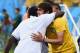 SAO PAULO, BRAZIL - JUNE 12: Former Brazil player Kaka (R) hugs a team member before the 2014 FIFA World Cup Brazil Group A match between Brazil and Croatia at Arena de Sao Paulo on June 12, 2014 in Sao Paulo, Brazil. (Photo by Buda Mendes/Getty Images)
