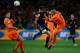 JOHANNESBURG, SOUTH AFRICA - JULY 11: Nigel De Jong of the Netherlands tackles Xabi Alonso of Spain during the 2010 FIFA World Cup South Africa Final match between Netherlands and Spain at Soccer City Stadium on July 11, 2010 in Johannesburg, South Africa. (Photo by Laurence Griffiths/Getty Images)