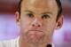 England national soccer team player Wayne Rooney listens to a journalist's question during a press conference after a training session for the 2014 soccer World Cup at the Urca military base in Rio de Janeiro, Brazil, Wednesday, June 11, 2014. The England soccer team are staying in Rio de Janeiro as their base city for the 2014 soccer World Cup. (AP Photo/Matt Dunham)