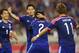 SAITAMA, JAPAN - MAY 27: (EDITORIAL USE ONLY) Shinji Kagawa of Japan congratulates Atsuto Uchida after he scored a goal during the Kirin Challenge Cup international friendly match between Japan and Cyprus at Saitama Stadium on May 27, 2014 in Saitama, Japan. (Photo by Mark Kolbe/Getty Images)