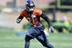 Jun 10, 2014; Denver, CO, USA; Denver Broncos cornerback Aqib Talib (21) runs a play during mini camp drills at the Broncos practice facility. Mandatory Credit: Ron Chenoy-USA TODAY Sports