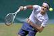 Switzerland's Roger Federer serves the ball to Mikhail Youzhny of Russia during the final of the ATP Gerry Weber Open tennis tournament in Halle , Westphalia, Germany, Sunday, June 16, 2013. (AP Photo/Martin Meissner)
