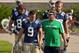 Aug. 4, 2012; South Bend, IN, USA; Notre Dame Fighting Irish head coach Brian Kelly talks with wide receiver Robby Toma (9) as they walk into practice at the LaBar Practice Complex. Mandatory Credit: Matt Cashore-USA TODAY Sports