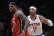 Miami Heat forward LeBron James (6) is shown with New York Knicks forward Carmelo Anthony (7) before their NBA basketball game at Madison Square Garden in New York, Sunday, March 3, 2013. (AP Photo/Kathy Willens)