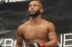 Defending Champion Demetrious Johnson warms up before fighting Joseph Benavidez for the UFC Flyweight Mixed Martial Arts title in Sacramento, Calif., on Saturday, Dec. 14, 2013.(AP Photo/Steve Yeater)