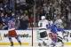 New York Rangers right wing Mats Zuccarello (36), at right, and left wing Benoit Pouliot (67) react after Pouliot scored a goal against the Los Angeles Kings in the first period during Game 4 of the NHL hockey Stanley Cup Final, Wednesday, June 11, 2014, in New York. (AP Photo/Kathy Willens)