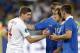 England's Steven Gerrard, left, shakes hands with Italy's Andrea Pirlo, second right, at the end of the Euro 2012 soccer championship quarterfinal match between England and Italy in Kiev, Ukraine, Monday, June 25, 2012. (AP Photo/Matthias Schrader)