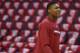 Washington Wizards guard Bradley Beal (3) walk though the empty arena before Game 4 of an Eastern Conference semifinal NBA basketball playoff game in Washington, Sunday, May 11, 2014. (AP Photo/Alex Brandon)