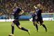 Netherlands' Robin van Persie celebrates with teammate Arjen Robben, right, after his scoring his side's fourth goal during the second half of the group B World Cup soccer match between Spain and the Netherlands at the Arena Ponte Nova in Salvador, Brazil, Friday, June 13, 2014. (AP Photo/Natacha Pisarenko)