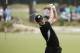 Martin Kaymer, of Germany, watches his tee shot on the seventh hole during the second round of the U.S. Open golf tournament in Pinehurst, N.C., Friday, June 13, 2014. (AP Photo/Chuck Burton)