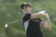 Martin Kaymer, of Germany, watches his tee shot on the 15th tee during the second round of the U.S. Open golf tournament in Pinehurst, N.C., Friday, June 13, 2014. (AP Photo/Chuck Burton)