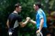 PINEHURST, NC - JUNE 13: Martin Kaymer of Germany (L) shakes hands with Keegan Bradley of the United States on the ninth green after Kaymer shot a five-under par 65 during the second round of the 114th U.S. Open at Pinehurst Resort & Country Club, Course No. 2 on June 13, 2014 in Pinehurst, North Carolina. (Photo by Sam Greenwood/Getty Images)