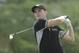 Martin Kaymer, of Germany, watches his tee shot on the 15th tee during the second round of the U.S. Open golf tournament in Pinehurst, N.C., Friday, June 13, 2014. (AP Photo/Chuck Burton)