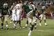 In this Oct. 19, 2013, photo, Baylor safety Ahmad Dixon (6) celebrates a defensive stop against Iowa State deep in Iowa State territory in the second half of an NCAA college football game in Waco, Texas. Dixon takes a deep breath and has the same thought each time he gets to the sideline after a defensive stop. ``I'm just like, Wow, this is really us, this is who we are,'' Dixon said. Baylor won the game 71-7. (AP Photo/Tony Gutierrez, file)