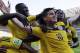 Colombia's James Rodriguez (10) celebrates with his teammates after scoring his side's third goal during the group C World Cup soccer match between Colombia and Greece at the Mineirao Stadium in Belo Horizonte, Brazil, Saturday, June 14, 2014. Colombia defeated Greece 3-0. (AP Photo/Fernando Vergara)