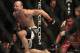Wanderlei Silva, left, celebrates after beating Cung Le, right, during the second round of a UFC 139 Mixed Martial Arts middleweight bout in San Jose, Calif., Saturday, Nov. 19, 2011. Silva won by TKO in the second round. (AP Photo/Jeff Chiu)