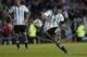 Argentina's Lionel Messi kicks the ball during an international friendly soccer match with Slovenia in La Plata, Argentina, Saturday, June 7, 2014. Argentina's team is leaving June 9 for Brazil to compete in the World Cup. (AP Photo/Eduardo Di Baia)