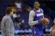 Kansas' Joel Embiid, right, talks with head coach Bill Self during practice for the NCAA college basketball tournament Thursday, March 20, 2014, in St. Louis. Kansas is scheduled to play Eastern Kentucky in a second-round game on Friday. (AP Photo/Jeff Roberson)