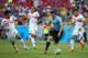 FORTALEZA, BRAZIL - JUNE 14: Cristian Rodriguez of Uruguay controls the ball against Yeltsin Tejeda of Costa Rica during the 2014 FIFA World Cup Brazil Group D match between Uruguay and Costa Rica at Castelao on June 14, 2014 in Fortaleza, Brazil. (Photo by Robert Cianflone/Getty Images)