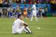 England's Gary Cahill sits on the pitch following England's 2-1 loss to Italy in their group D World Cup soccer match at the Arena da Amazonia in Manaus, Brazil, Saturday, June 14, 2014. (AP Photo/Marcio Jose Sanchez)