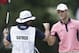 Jun 14, 2014; Pinehurst, NC, USA; Martin Kaymer (right) celebrates with caddie Craig Connolly (left) after a made putt on the 5th green during the third round of the 2014 U.S. Open golf tournament at Pinehurst Resort Country Club - #2 Course. Mandatory Credit: Jason Getz-USA TODAY Sports