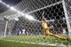 England's goalkeeper Joe Hart fails to stop a goal by Italy's Mario Balotelli's during the second half of the group D World Cup soccer match between England and Italy at the Arena da Amazonia in Manaus, Brazil, Saturday, June 14, 2014. The goal gave Italy a 2-1 win. (AP Photo/Marcio Jose Sanchez)