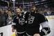 Los Angeles Kings right wing Dustin Brown, left, and teammate defenseman Drew Doughty celebrate after beating the New York Rangers in overtime in Game 5 of the NHL Stanley Cup Final series Friday, June 13, 2014, in Los Angeles. (AP Photo/Jae C. Hong)