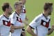German national soccer player Bastian Schweinsteiger, center, laughs during a training session in Santo Andre near Porto Seguro, Brazil, Saturday, June 14, 2014. Germany will play in group G of the 2014 soccer World Cup. (AP Photo/Matthias Schrader)
