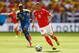 BRASILIA, BRAZIL - JUNE 15: Granit Xhaka of Switzerland dribbles past Enner Valencia of Ecuador during the 2014 FIFA World Cup Brazil Group E match between Switzerland and Ecuador at Estadio Nacional on June 15, 2014 in Brasilia, Brazil. (Photo by Phil Walter/Getty Images)