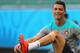 SALVADOR, BRAZIL - JUNE 15: Cristiano Ronaldo stretchs during the Portugal training session ahead of the 2014 FIFA World Cup Group G match between Germany and Portugal held at the Arena Fonte Nova on June 15, 2014 in Salvador, Brazil. (Photo by Martin Rose/Getty Images)