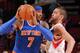 HOUSTON, TX - JANUARY 3: Carmelo Anthony #7 of the New York Knicks drives against Chandler Parsons #25 of the Houston Rockets on January 3, 2014 at the Toyota Center in Houston, Texas. NOTE TO USER: User expressly acknowledges and agrees that, by downloading and or using this photograph, User is consenting to the terms and conditions of the Getty Images License Agreement. Mandatory Copyright Notice: Copyright 2014 NBAE (Photo by Bill Baptist/NBAE via Getty Images)