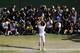 Andy Murray of Britain poses for photographers with the trophy after defeating Novak Djokovic of Serbia in the Men's singles final match at the All England Lawn Tennis Championships in Wimbledon, London, Sunday, July 7, 2013. (AP Photo/Tom Hevezi, Pool)