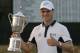 Martin Kaymer, of Germany, poses with the trophy after wining the U.S. Open golf tournament in Pinehurst, N.C., Sunday, June 15, 2014. (AP Photo/Eric Gay)
