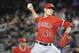 Los Angeles Angels starting pitcher Garrett Richards throws in the first inning of their baseball game against the New York Yankees at Yankee Stadium, Sunday, April 27, 2014, in New York. The Yankees won 3-2. (AP Photo/John Minchillo)