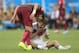 Portugal's Pepe , left, puts his head on Germany's Thomas Mueller during the group G World Cup soccer match between Germany and Portugal at the Arena Fonte Nova in Salvador, Brazil, Monday, June 16, 2014. Pepe was red carded after this. (AP Photo/Bernat Armangue)