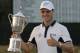 Martin Kaymer, of Germany, poses with the trophy after wining the U.S. Open golf tournament in Pinehurst, N.C., Sunday, June 15, 2014. (AP Photo/Eric Gay)