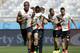 Belgium’s Vincent Kompany, left front, runs with teammates during a training session at the Mineirao Stadium in Belo Horizonte, Brazil, Monday, June 16, 2014. Belgium will play in group H of the Brazil 2014 soccer World Cup. (AP Photo/Bruno Magalhaes)