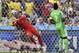 Nigeria's goalkeeper Vincent Enyeama makes a save during the group F World Cup soccer match between Iran and Nigeria at the Arena da Baixada in Curitiba, Brazil, Monday, June 16, 2014. (AP Photo/Martin Meissner)